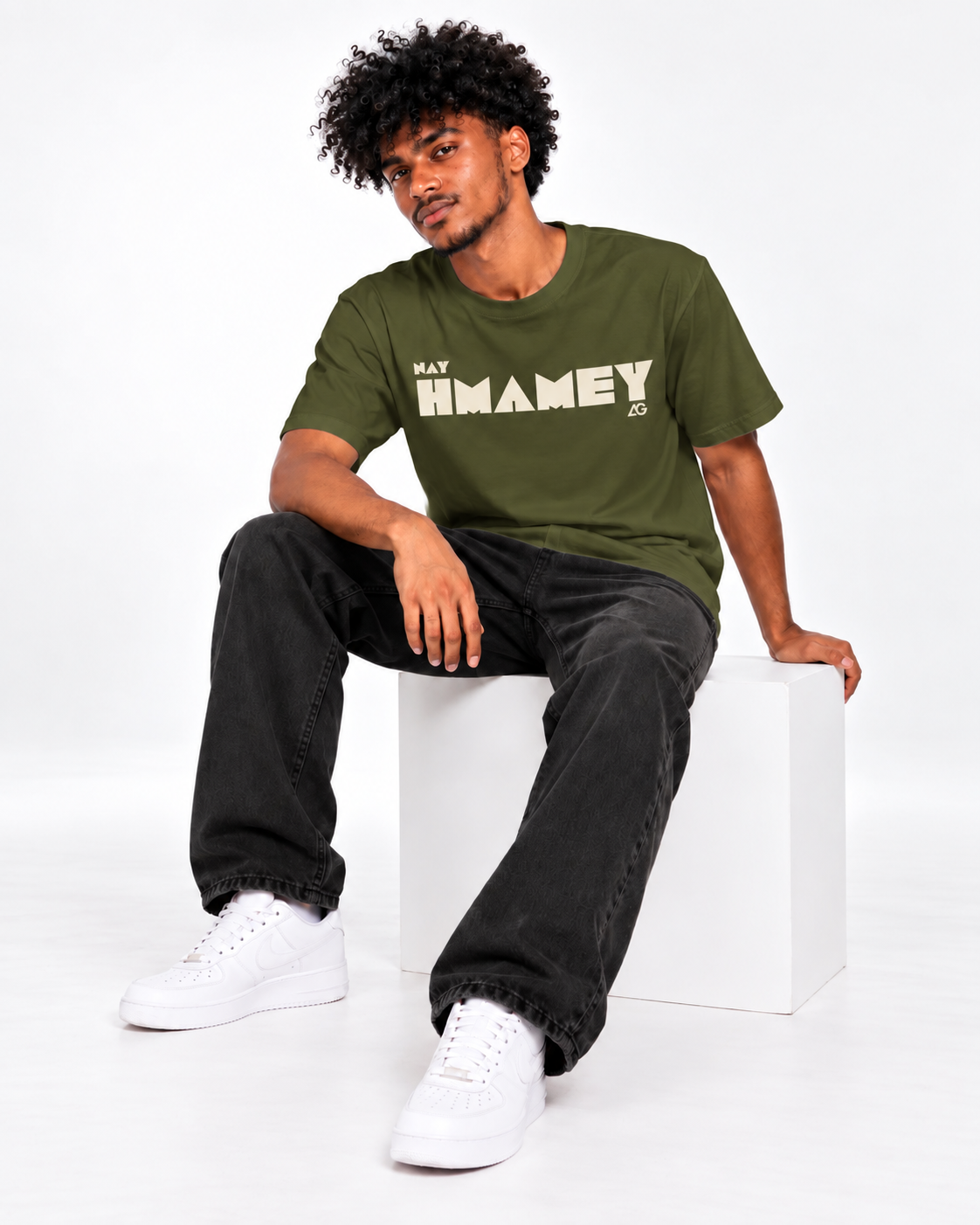 Male model wearing the olive Nay Hmamey Heavyweight T-Shirt